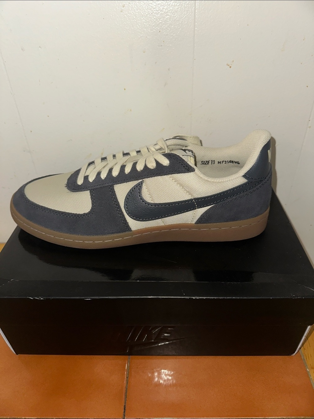 Nike Low-Top Sneakers in Cream and Navy with Gum Sole